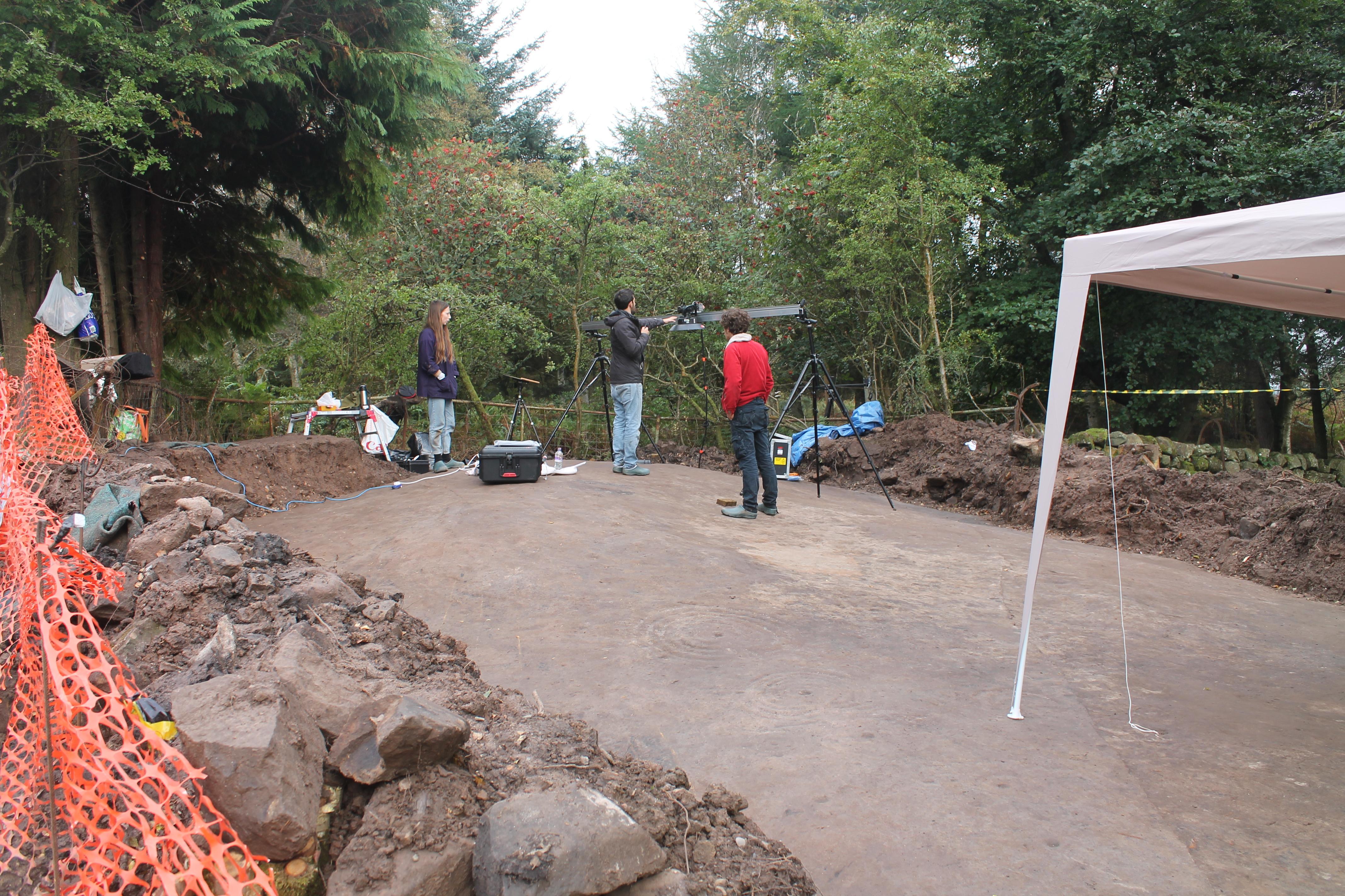 Team of Archeoligists digging for rock art in Faifley